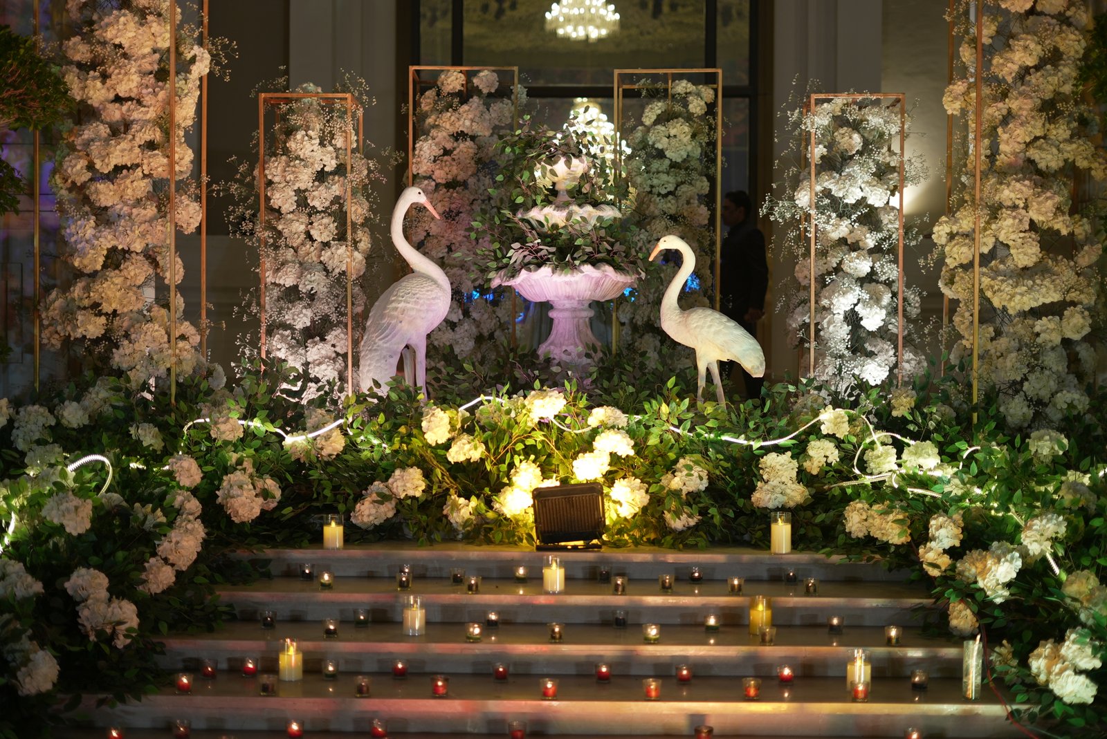 Floral arrangements on pillars