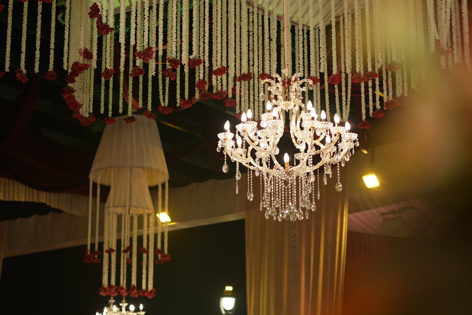 Night celebration setting with chandeliers